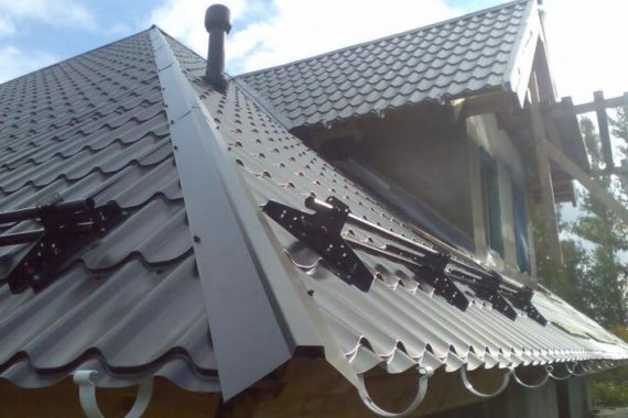 Установка снегозадержателей